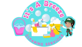 A person cleaning an elegant bathroom mirror with a fluffy duster and yellow gloves.